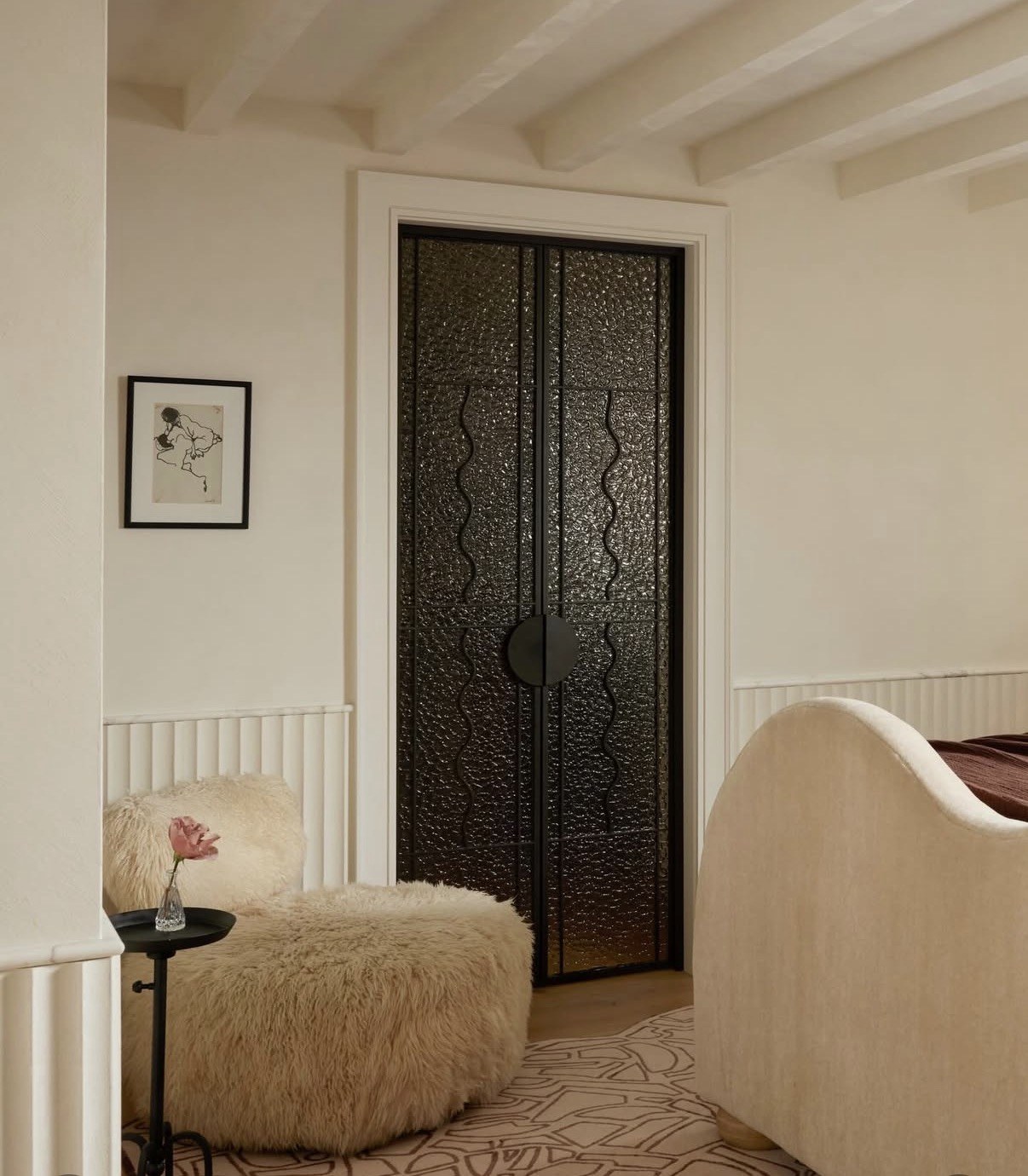 Custom door installation with fluted wainscoting